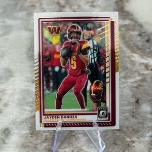 🔥 2025 Jayden Daniels Panini Donruss Optic Card. Washington Commanders